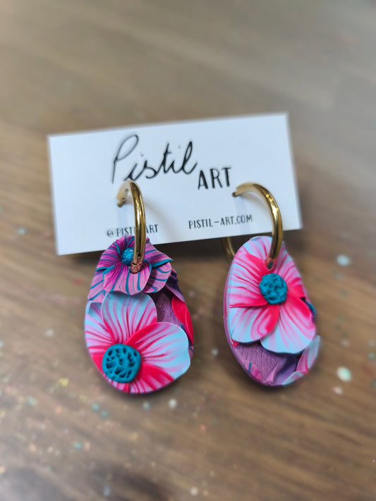 16- boucles d'oreilles jardin fleuri mauve créole ovale
