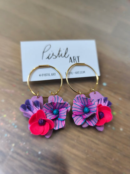 20- boucles d'oreilles fleur mauve